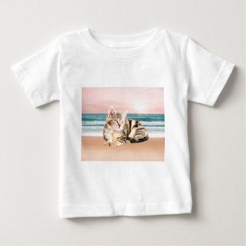 A Cuter Striped Cat Sitting on Beach with sunset Baby T_Shirt
