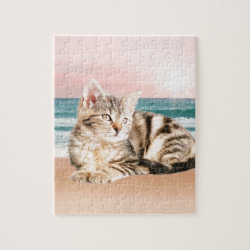 A Cuter Striped Cat Sitting on Beach with sunset Jigsaw Puzzle
