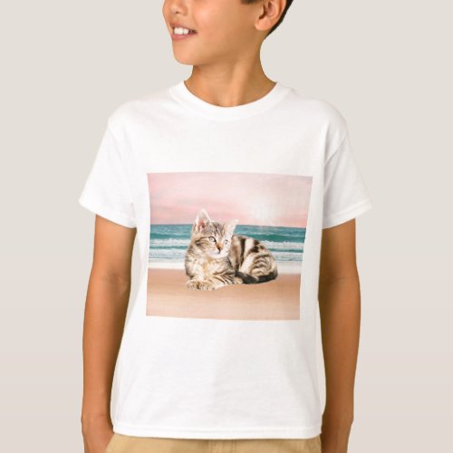 A Cuter Striped Cat Sitting on Beach with sunset T_Shirt