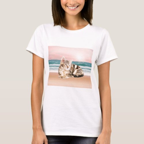 A Cuter Striped Cat Sitting on Beach with sunset T_Shirt