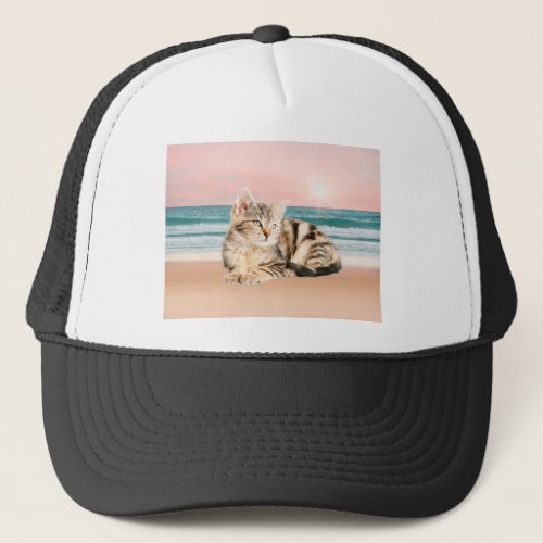 A Cuter Striped Cat Sitting on Beach with sunset Trucker Hat