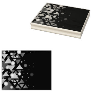 a dark background with gold triangles and blurry rubber stamp