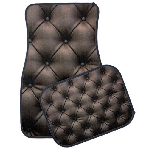 A dark leather cushion background from a car seat car floor mat