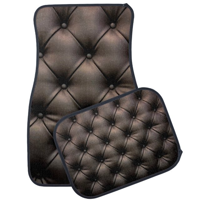 A dark leather cushion background, from a car seat floor mat (Set)