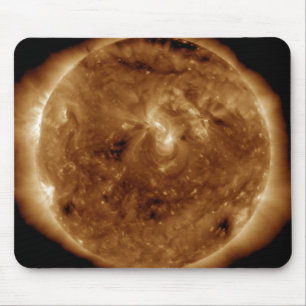 A dark rift in the sun's atmosphere mouse pad