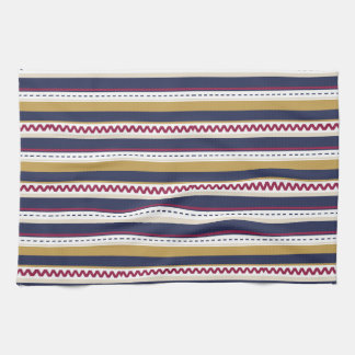 A decorative fabric features horizontal kitchen towel