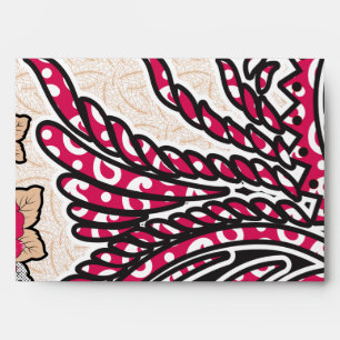 A decorative paisley design with vivid red and pin envelope
