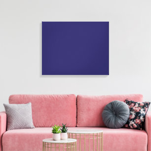 A deep blue backdrop accented by a white border, o canvas print