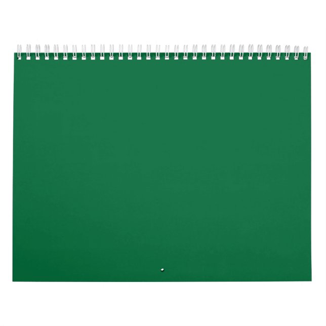 A deep green background contrasted by a crisp whit calendar