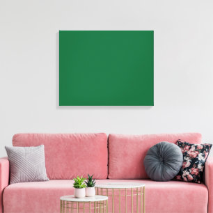 A deep green background contrasted by a crisp whit canvas print