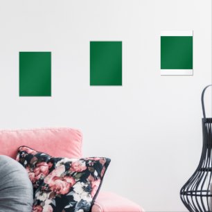 A deep green background contrasted by a crisp whit wall art sets