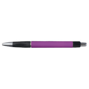 A deep purple background accented by a bright whit pen