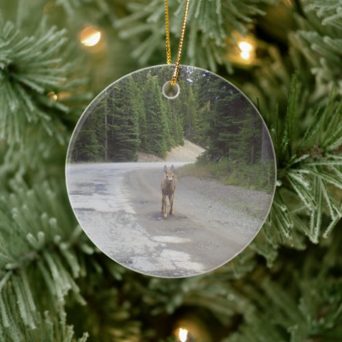 A deer in the forest tree ornament