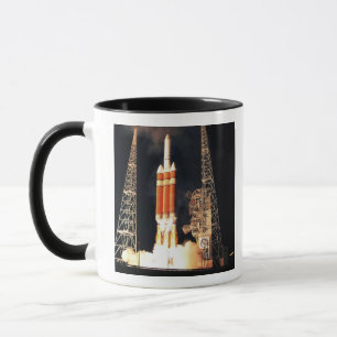A Delta IV Heavy rocket lifts off Mug