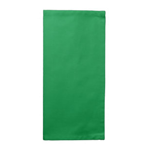 A dense, lush forest filled with vibrant green tre cloth napkin