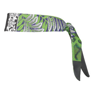 a design of a green and yellow pattern tie headband