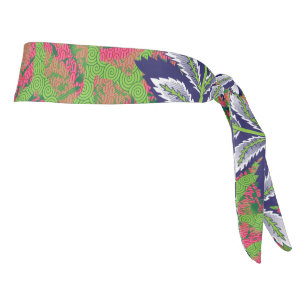 a design of a green and yellow pattern tie headband