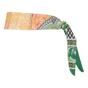 a design of a green and yellow wall hanging tie headband