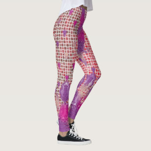 a design of a purple background with dots leggings