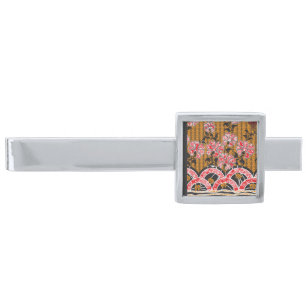 a design of a red and black wall hanging silver finish tie bar