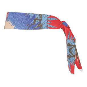  a design of a red background with a blue circle tie headband