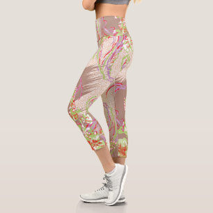 a design of a red vase with flowers on it capri leggings