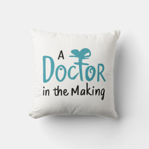A doctor in the making throw pillow