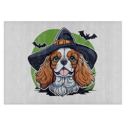 A dog wearing a witches hat with bats cutting board