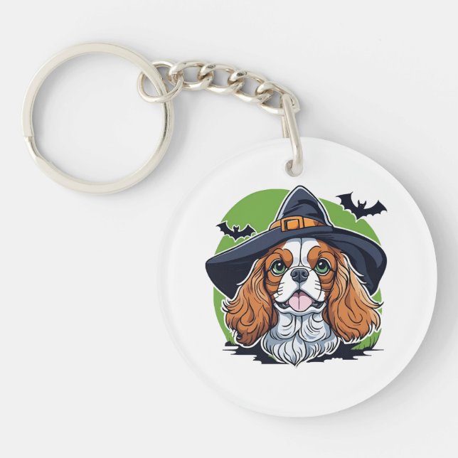 A dog wearing a witches hat with bats keychain (Front)