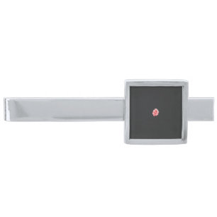 a drawing of a red flower on a white background silver finish tie bar
