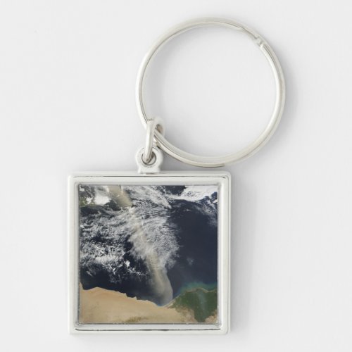 A dust plume keychain