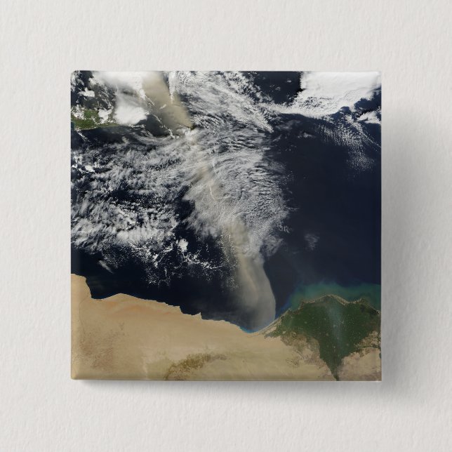 A dust plume pinback button (Front)