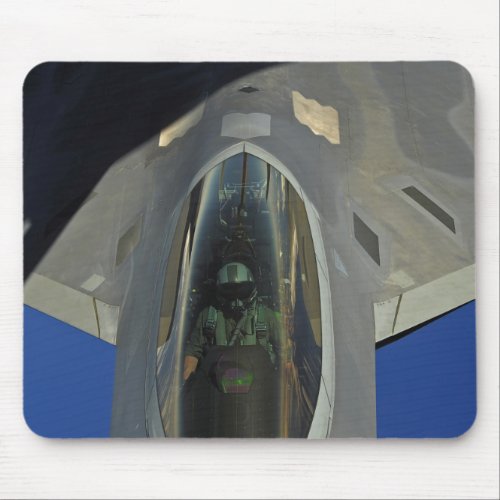 A F_22 Raptor receives fuel from a KC_135 Mouse Pad