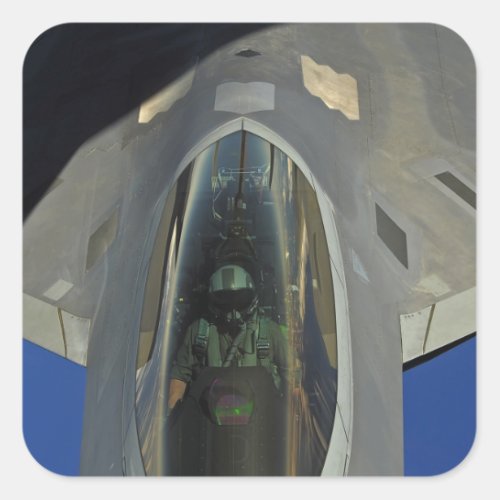 A F_22 Raptor receives fuel from a KC_135 Square Sticker