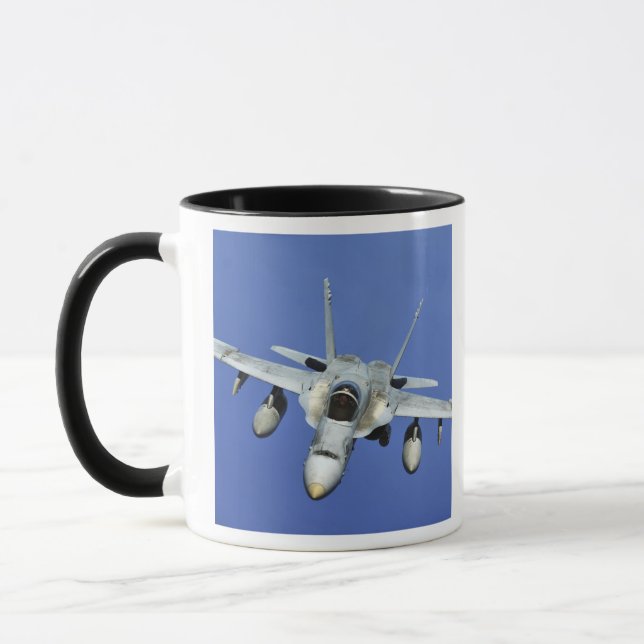 A F/A-18 Hornet participates in a mission Mug (Left)