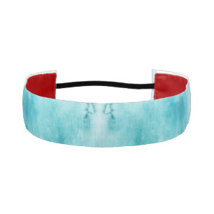 A fabric headband with a light blue tie-dye