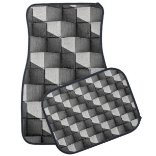 A face of the "Four Sided Pyramid" sculpture in th Car Floor Mat