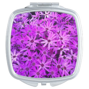 A field of Purple and Pink Daisies Makeup Mirror