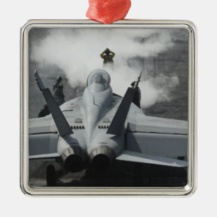 A flight deck director signals an F/A-18F Metal Ornament