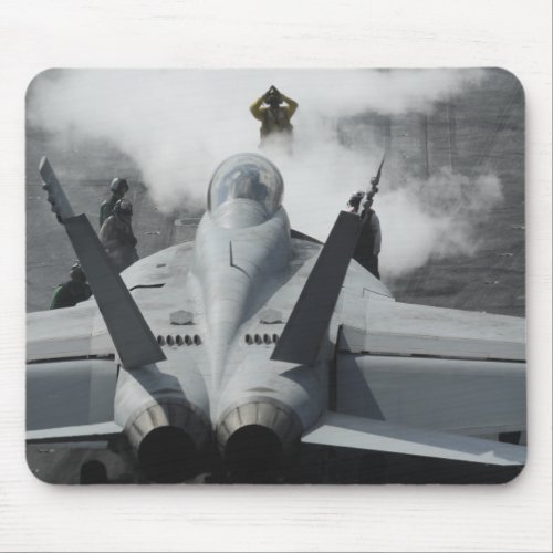 A flight deck director signals an FA_18F Mouse Pad