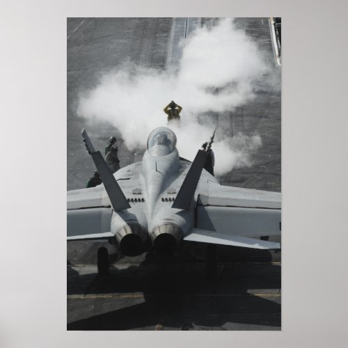 A flight deck director signals an FA_18F Poster