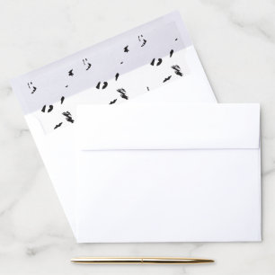 A flock of birds flying in the sky. envelope liner