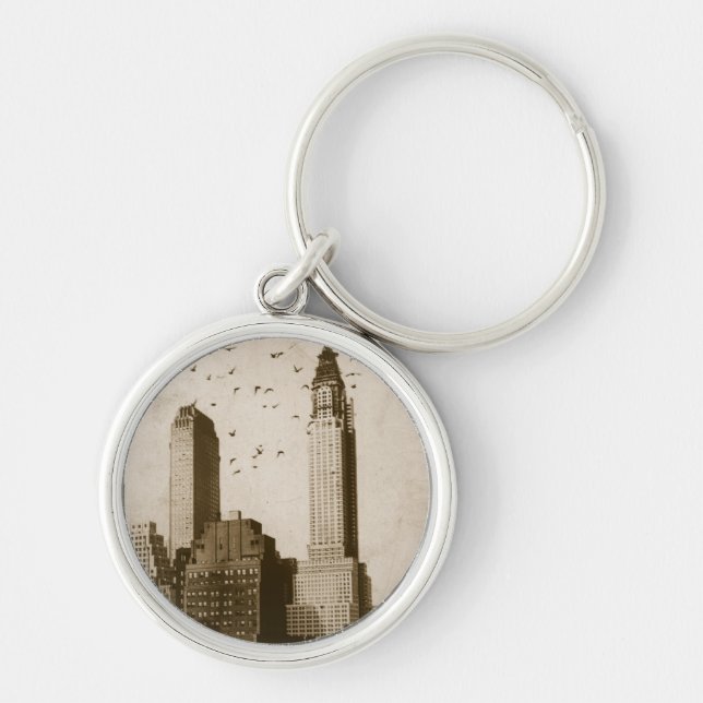 A flock of birds flying keychain (Front)