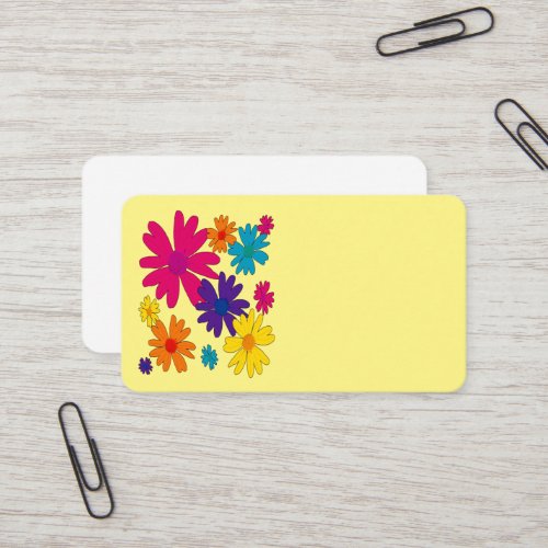 A floral bed of daisy flowers  business card