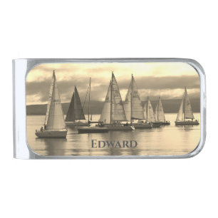A flotilla of yachts at sea. silver finish money clip