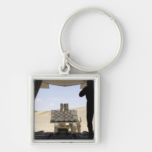 A forklift loads cargo onto a C-130 Hercules Keychain (Front)