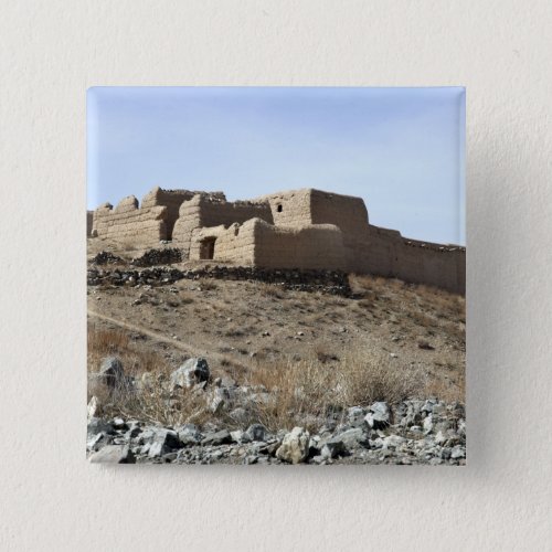A fortified compound in the village of Akbar Kh Pinback Button