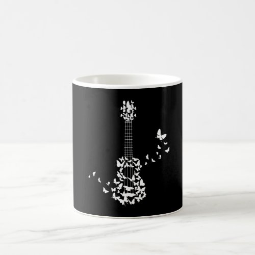 A Four String Ukulele Instrument With Beautiful Coffee Mug