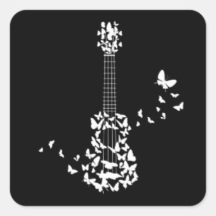 A Four String Ukulele Instrument With Beautiful Square Sticker