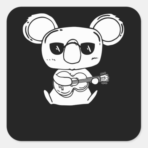 A Four String Ukulele Instrument With Koala Square Sticker